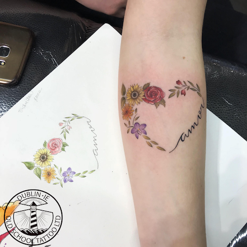 heart of flowers tattoo
